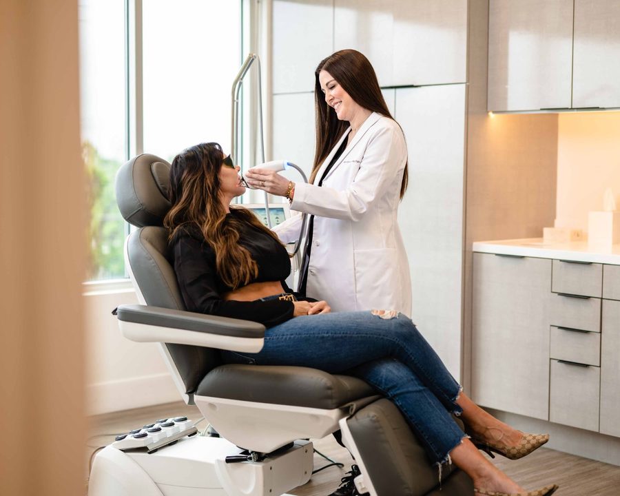 Provider performing an in-office laser skin treatment at The Piazza Center in Austin, TX
