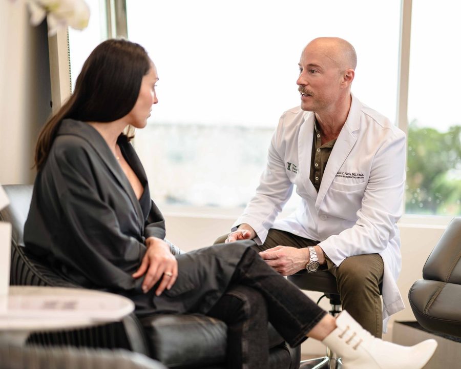 Dr. Rocco Piazza consulting with a patient at The Piazza Center